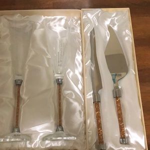 Oleg Cassini. Champagne flutes and cake serving set.